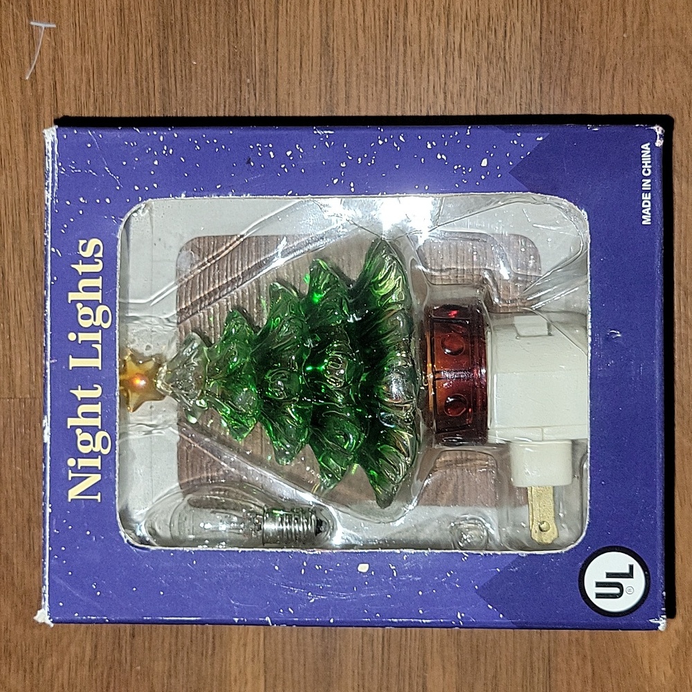 Costco Christmas tree night light with 7 watt bulb Excellent preowned condition…